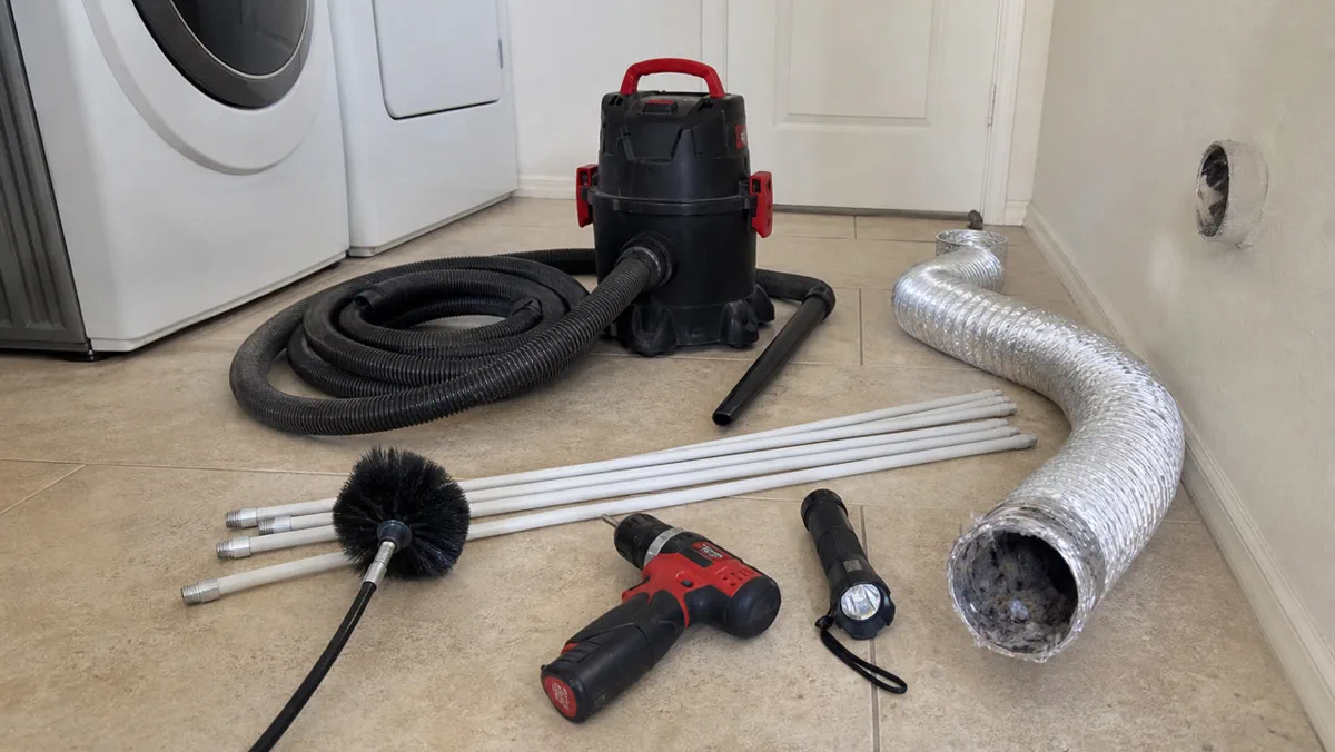 Rotary brush and vacuum equipment set up for a full-route dryer vent cleaning